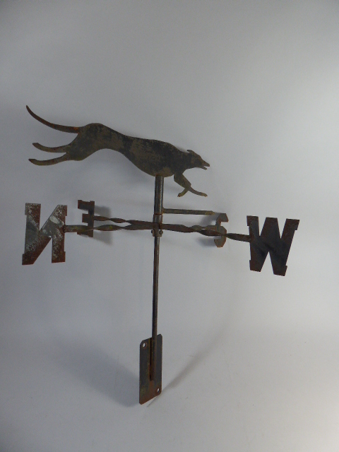 A Vintage Wrought Iron Weathervane, The Blade Modelled as a Greyhound,