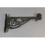 A Victorian Style Street Light Bracket with Ornate Castings.