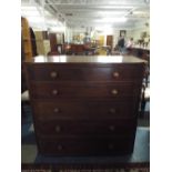 A Late Victorian Bow Fronted Mahogany Chest of Two Short and Four Long Drawers with Turned Handles.