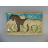 A Mid 20th Century Danish Ceramic Wall Plaque of Three Horses.