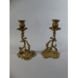 A Pair of Late 19th Century Gilt Brass Candle Sticks,