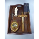 A Wooden Tray Containing Various Crucifix, Madonna,