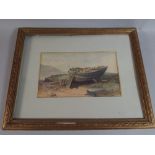 A Framed Water Colour of a Neglected Wooden Boat