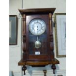 A Modern Mahogany Framed Westminster Chime Wall Clock