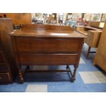 An Oak Two Drawer Bedroom Chest with Raised Gallery