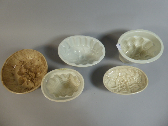 A Collection of Five Victorian Glazed Jelly Moulds