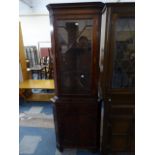 A Mahogany Double Free Standing Cabinet with Glazed Top