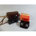 A Leather Cased Pair of Imperator 3x25 Binoculars,