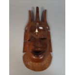 A Carved African Tribal Mask,