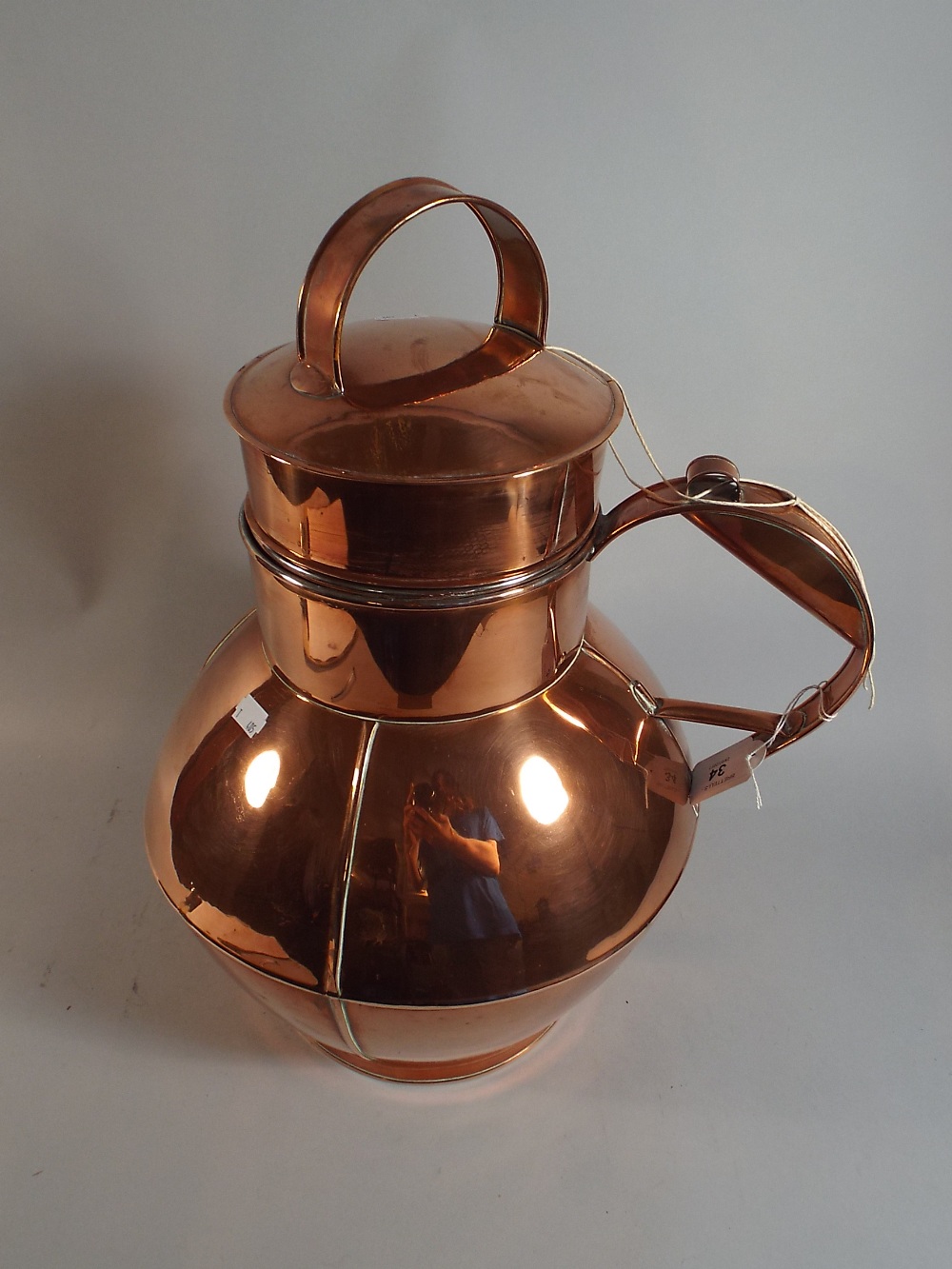 A Guernsey Copper Ewer with Inner Removable Rose,