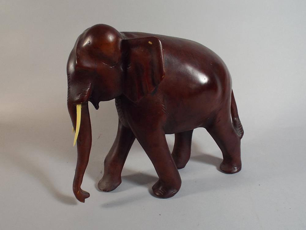 A Carved Wooden Study of an Elephant, One Tusk Glued, - Image 2 of 2