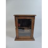 An Oak Glazed Smokers Box with Fitted Interior,