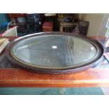 An Edwardian Oval Scumble Glazed Wall Mirror,