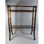 An Edwardian Mahogany Towel Rail