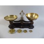 A Set of Brass Mounted Pan Scales by W and T Avery with Four Brass weights Stamped City of Bristol