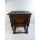 An Oak Lift Top Sewing Box with Fall Front and Inner Drawer,