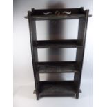 An Ebonised Four Shelf Open Bookcase with Pierced Gallery.