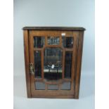 A Late Victorian Faux Rosewood Glazed Corner Cabinet with String Inlay and Shelved Interior,