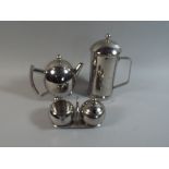 A Modern Four Piece Stainless Steel Tea Service