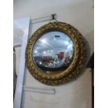 A Circular Pierced Gilt Framed Convex Wall Mirror,