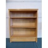 A Light Oak Two Shelf Open Bookcase,