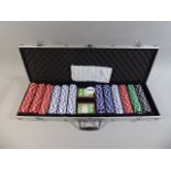 A Cased Texas Hold'em Poker Set with Chips and Playing Cards,