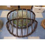 Two Victorian Wrought Iron Hay Cratches and Three Wire Hanging Baskets