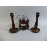 A Silver Plate Topped Oak Biscuit Barrel and Pair of Oak Candle Sticks