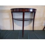 A Mahogany Demi Lune Side Table with Stretcher Shelf on Extending Cabriole Legs,