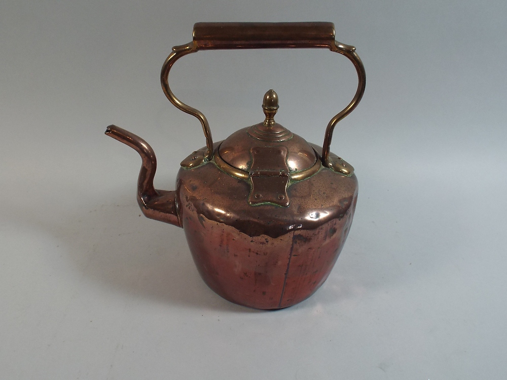 A Mid Victorian Copper Kettle with Hinged Lid,