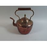 A Mid Victorian Copper Kettle with Hinged Lid,