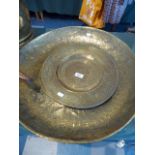 A Large Islamic Etched Circular Brass Tray and Etched Brass Wall Plaque,