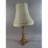 A Gilt Wood Table Lamp and Shade