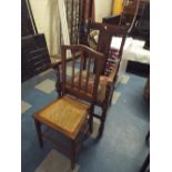 An Edwardian Oak Framed Armchair and Cane Seated Bedroom Chair