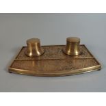 A Brass Desk Top Pen Tray with Two Ink Bottles Having Etched Decoration,