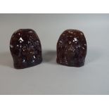 A Pair of 19th Century Treacle Glazed Lion Mask Sash Window Stops