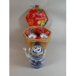 An Oriental Blue and White Three Piece Tea Set Fitted In Hexagonal Wicker Basket,