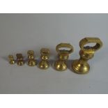 A Graduated Set of Six Brass Bell Weights