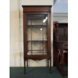 An Edwardian Inlaid Glazed Display Cabinet on Square Tapering Supports with Spade Feet,