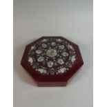 An Oriental Mother of Pearl Inlaid Octagonal Box with Five Inner Trays,