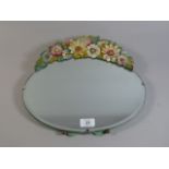 A Vintage Oval Bevel Edge Mirror with Moulded Floral Mount,