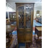 An Old Charm Oak Double Freestanding Corner Cabinet with Glazed Top Section