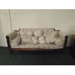 A Late 19th Century Rosewood and Oak Framed Upholstered Salon Settee. Padded Back and Over-arms.