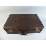 An Early 20th Century Alligator Skin Suitcase,