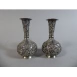 A Pair of Early 20th Century Eastern Silver Bud Vases of Baluster Form.