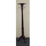 A Mahogany Tripod Torchere Stand with Turned Reeded Support and Shaped Square Top.