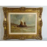 A Gilt Framed Dutch Oil on Board Depicting Fishing Barges on Beach.