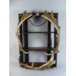 A 19th Century Black Forest Folk Art Chip-Carved Wall Shelf Decorated with Deer Antlers,