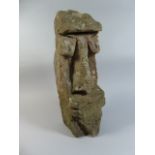 A Carved Sandstone Grotesque Head,