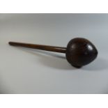 An Early 20th Century South African Zulu Knobkerrie with a Large Bulbous Head and Cylindrical Shaft,